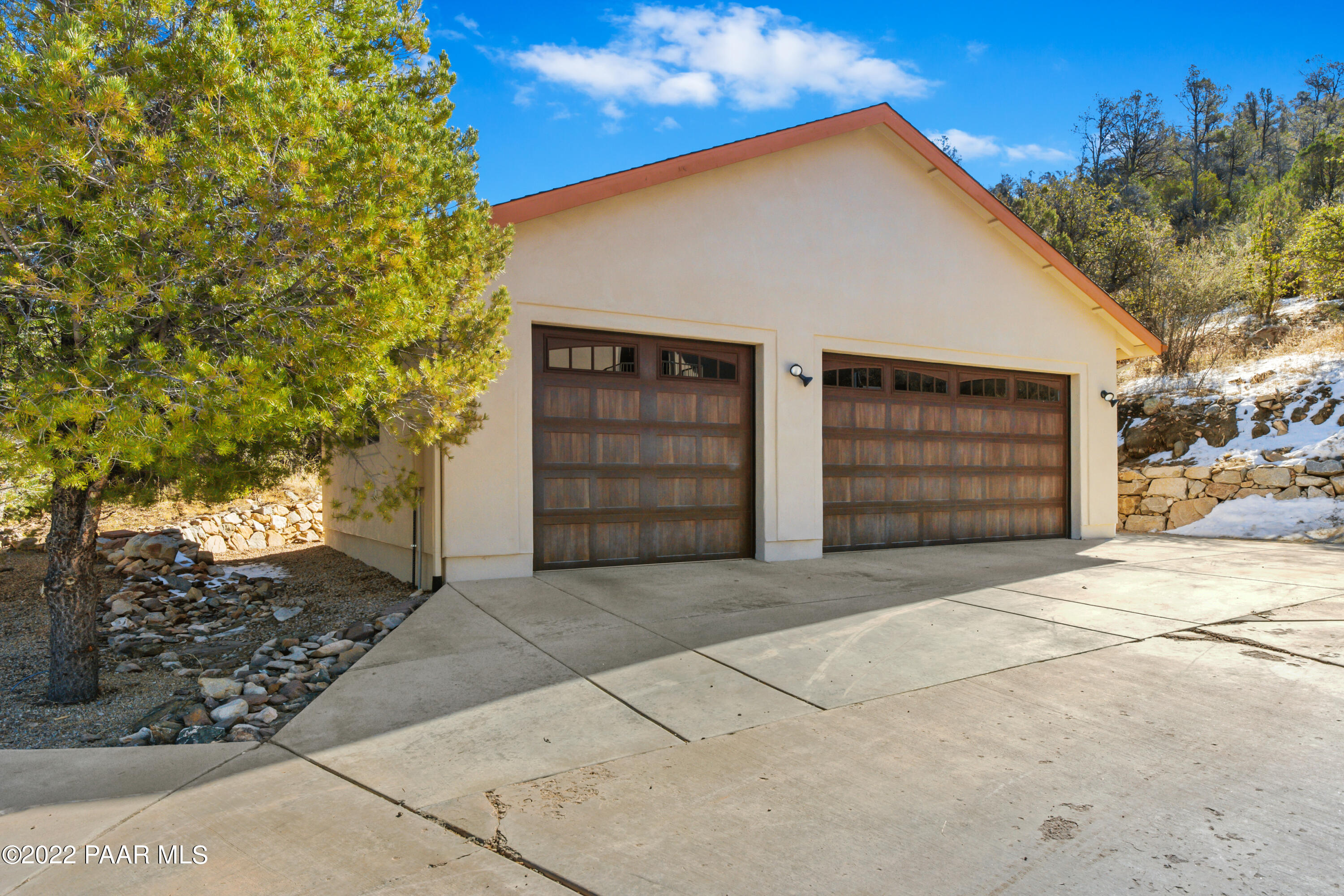 3000 Shadow Valley Ranch Road Prescott, AZ 86305 - Photo 49 of 54 a front view of a house with a garage