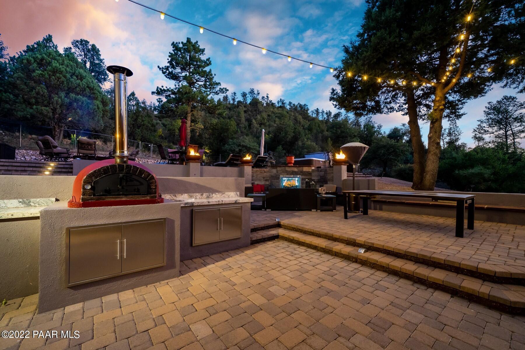 3000 Shadow Valley Ranch Road Prescott, AZ 86305 - Photo 52 of 54 a swimming pool with outdoor seating yard and barbeque oven