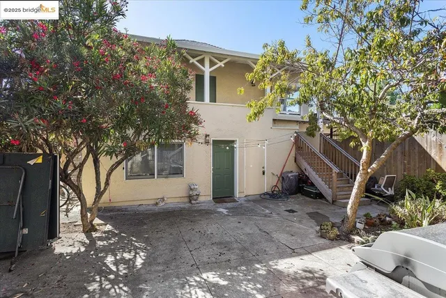 a view of a house with a tree