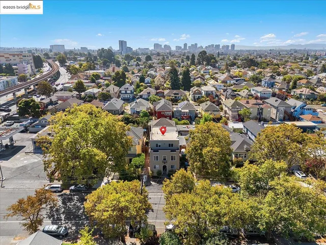 an aerial view of a city with lots of residential buildings