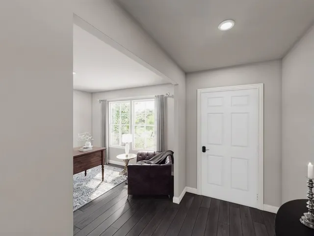 a room with furniture and a window