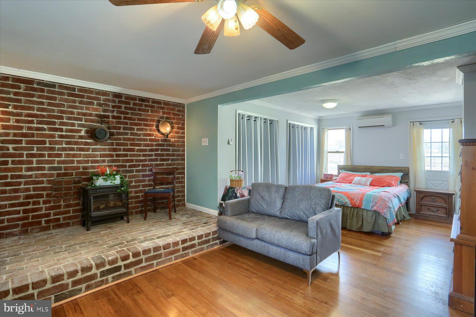 1014 Pondtown Road Dillsburg, PA 17019 - Photo 14 of 42 a living room with furniture and a fireplace