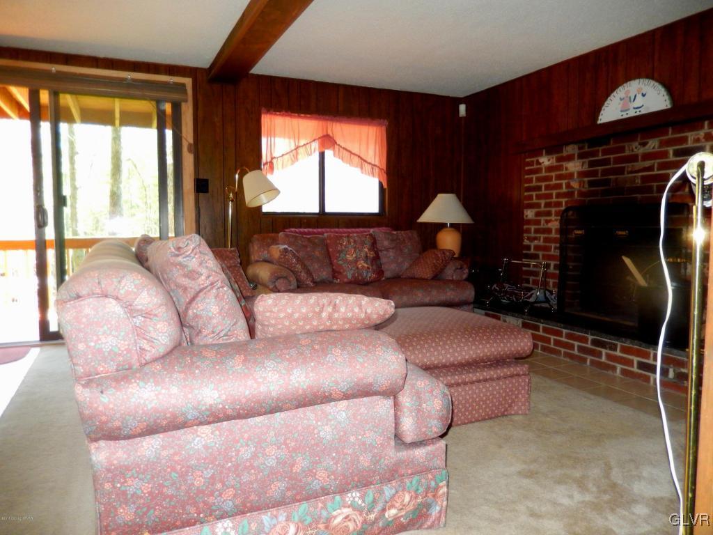 6122 Decker Road Bushkill, PA 18324 - Photo 14 of 33 a living room with furniture and a window