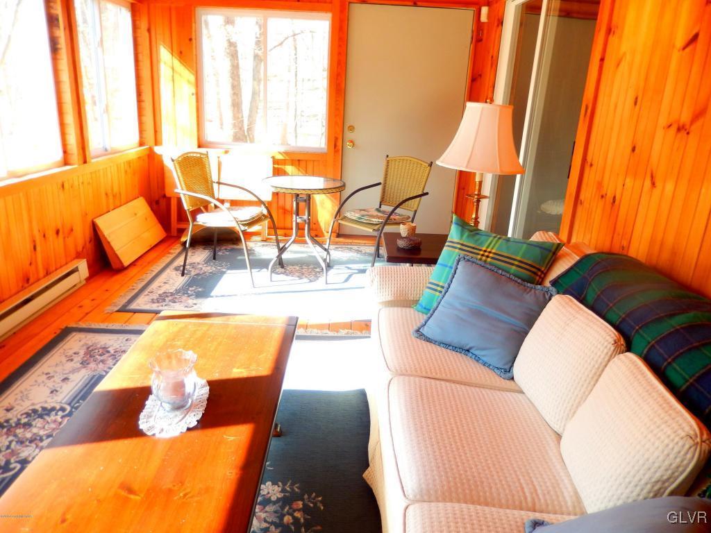 6122 Decker Road Bushkill, PA 18324 - Photo 20 of 33 a living room with furniture and a large window