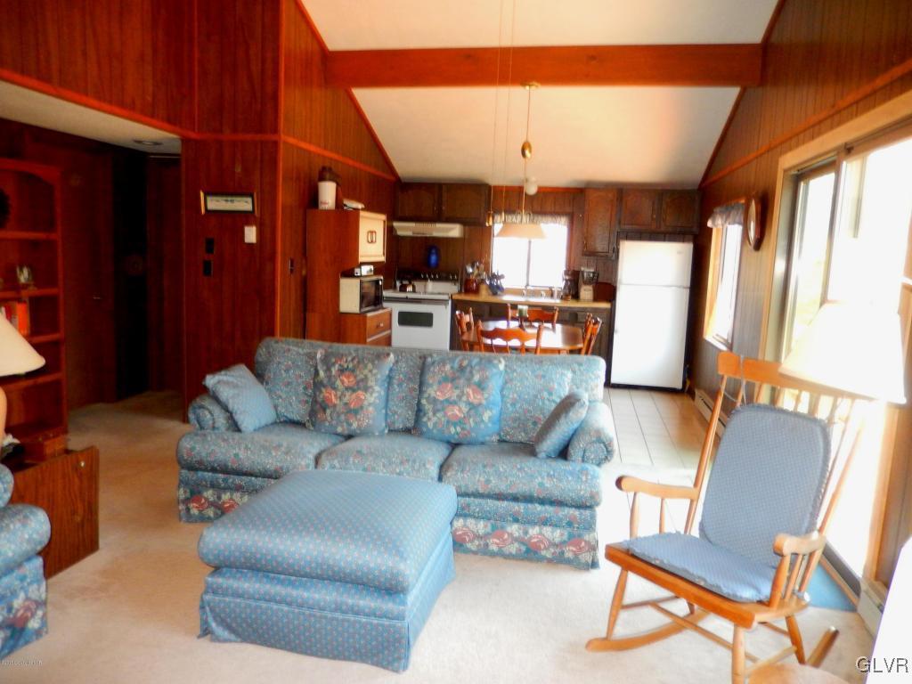 6122 Decker Road Bushkill, PA 18324 - Photo 8 of 33 a living room with furniture and a large window