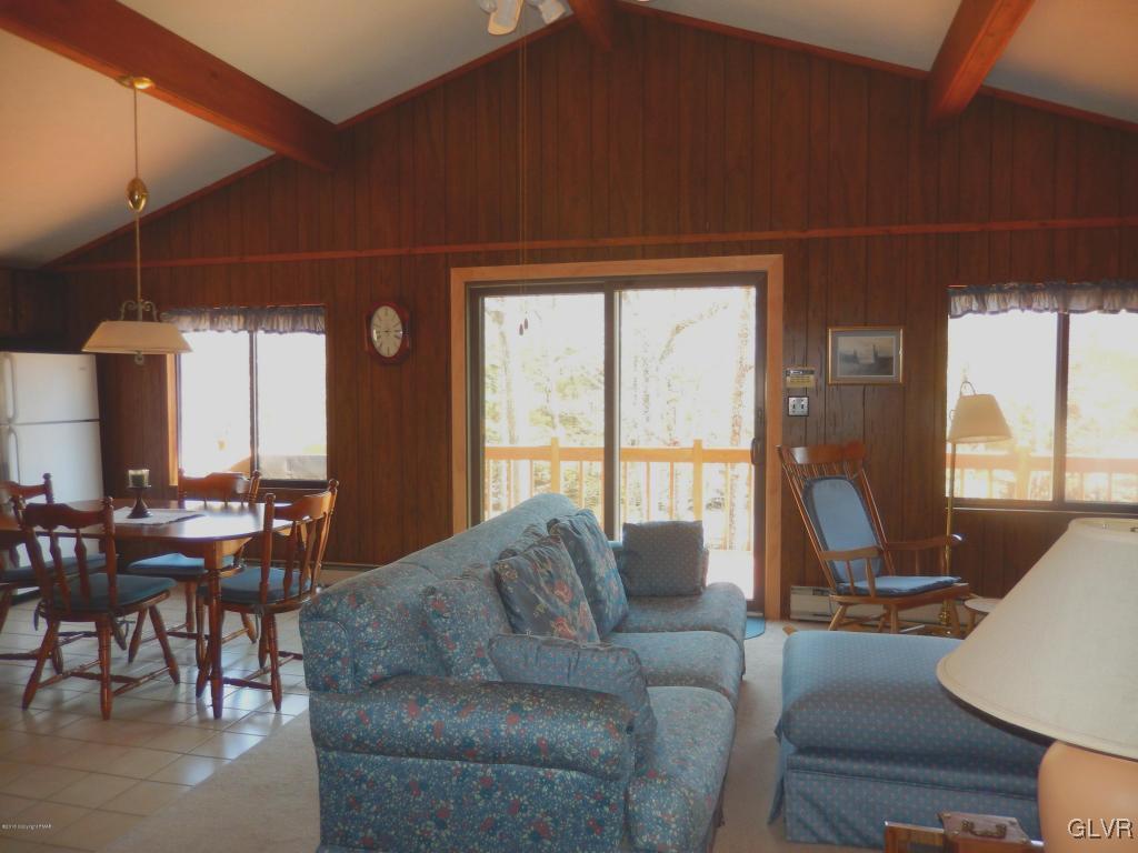 6122 Decker Road Bushkill, PA 18324 - Photo 9 of 33 a living room with furniture and a large window