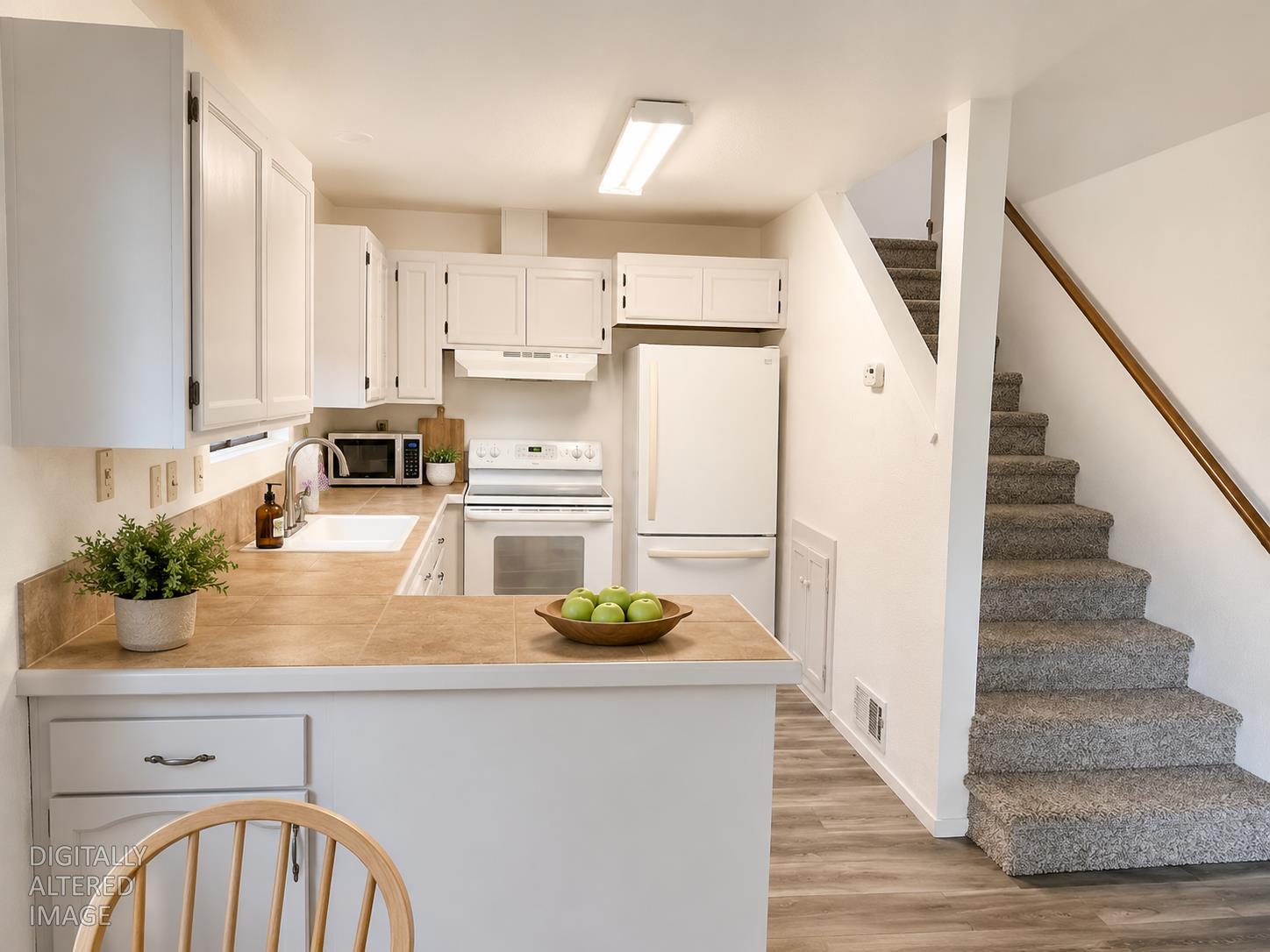 140 Depot Street Colfax, CA 95713 - Photo 5 of 31 kitchen and stairs to the bedrooms and family room