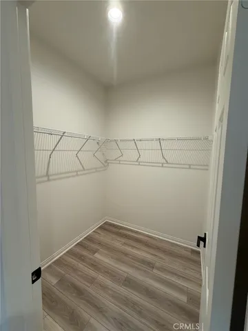 a bathroom with a sink mirror toilet and shower