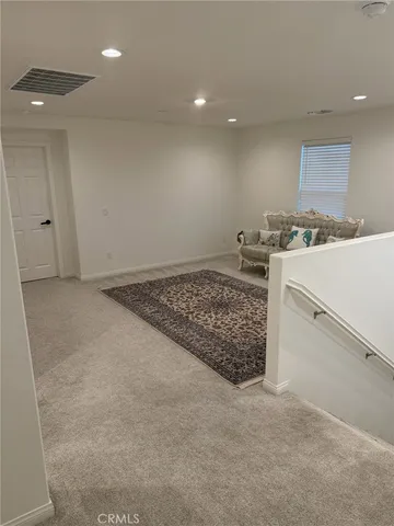 a bed room with a bed and a couch