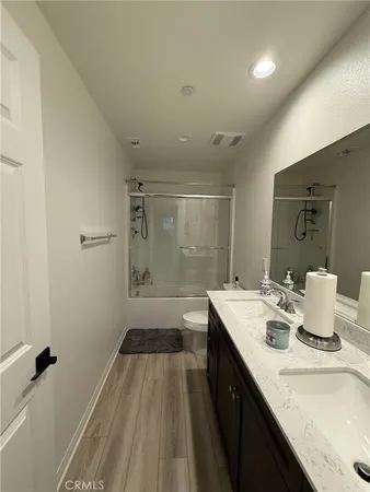 a living room with lots of furniture and a window