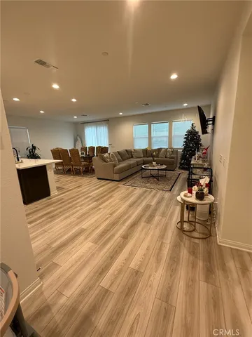 a bedroom with a bed and a table