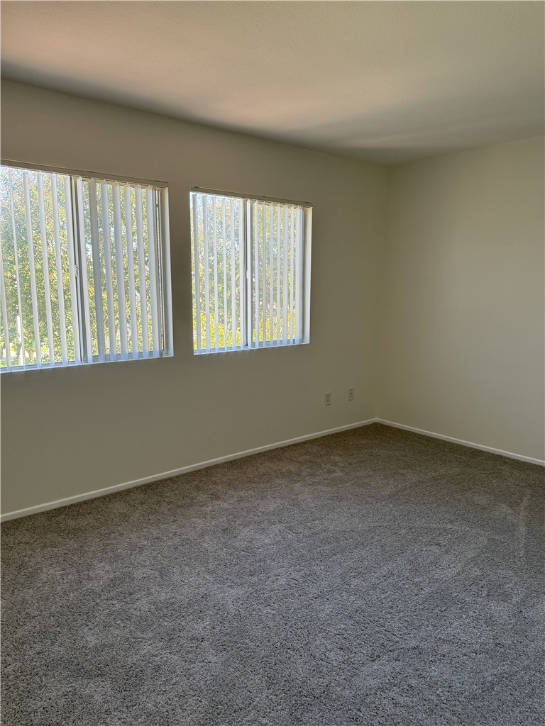 9593 Heartland Place Rancho Cucamonga, CA 91730 - Photo 10 of 13 an empty room with a window