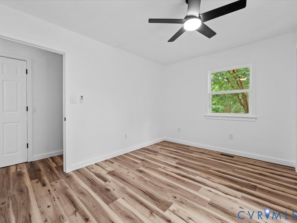 2291 Pony Farm Road Maidens, VA 23102 - Photo 19 of 43 a view of empty room with wooden floor