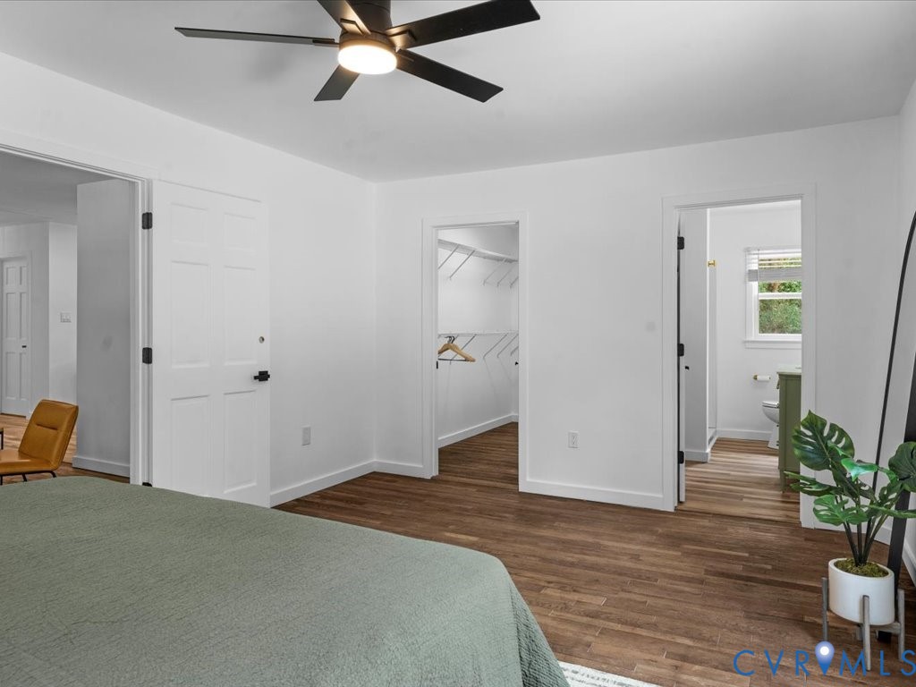 2291 Pony Farm Road Maidens, VA 23102 - Photo 22 of 43 a bedroom with a bed and wooden floor