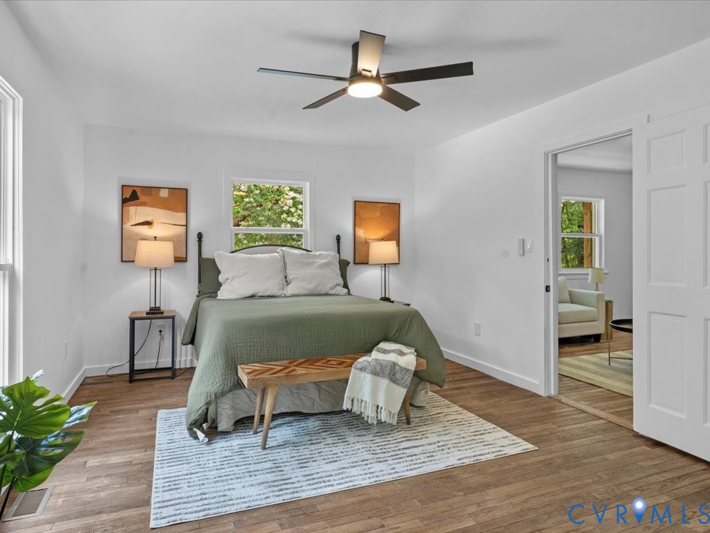 2291 Pony Farm Road Maidens, VA 23102 - Photo 25 of 43 a bedroom with a bed and a chandelier