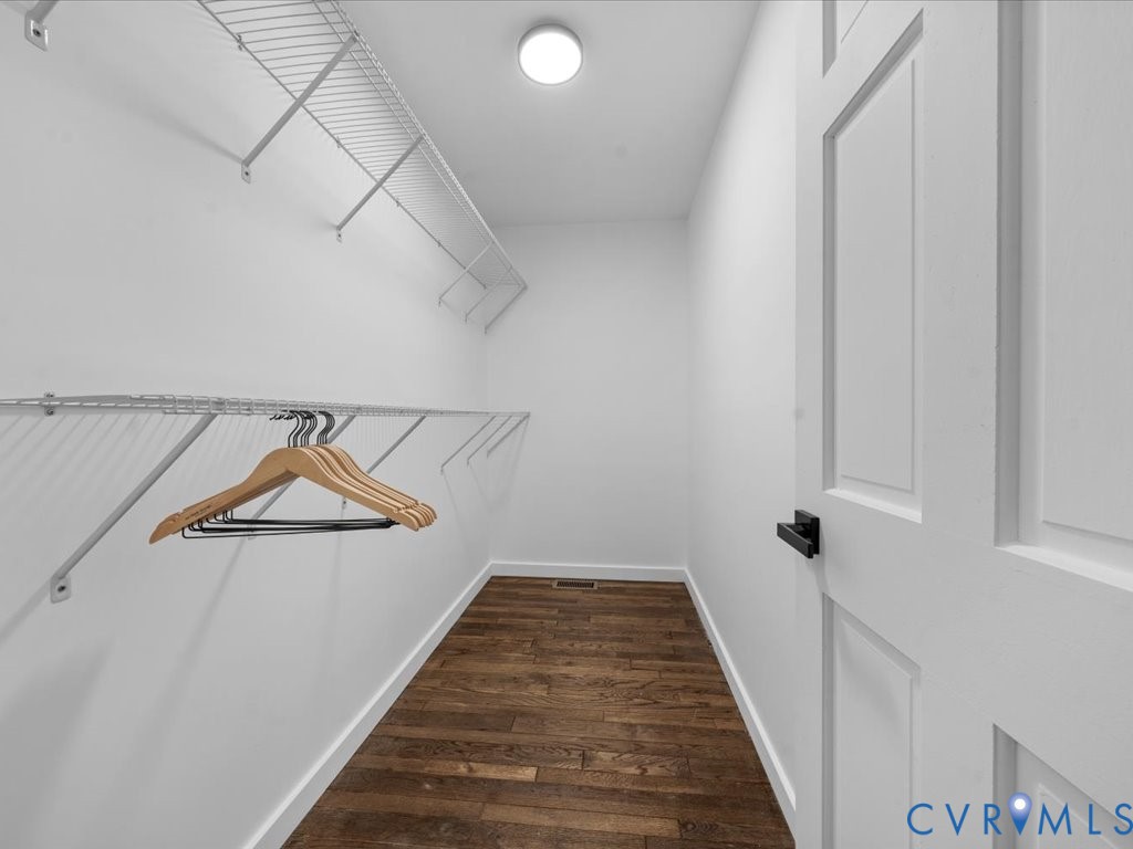 2291 Pony Farm Road Maidens, VA 23102 - Photo 26 of 43 a view of a hallway with wooden floor and staircase