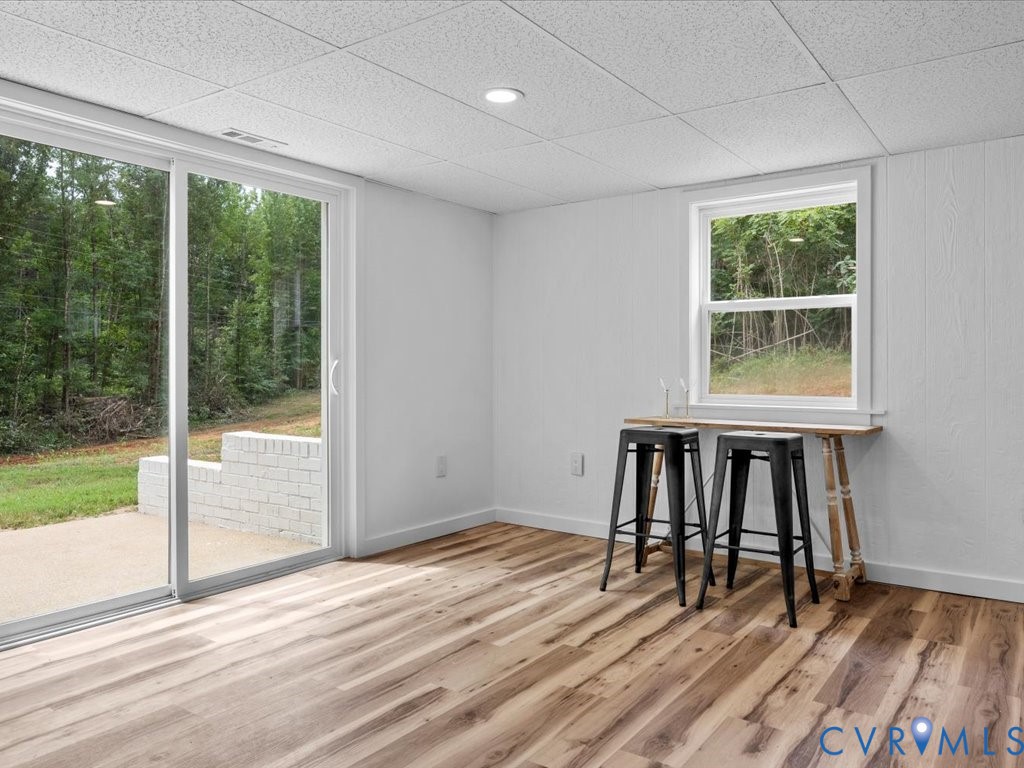 2291 Pony Farm Road Maidens, VA 23102 - Photo 33 of 43 a view of an empty room with wooden floor and a window