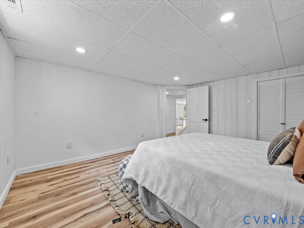 2291 Pony Farm Road Maidens, VA 23102 - Photo 39 of 43 a bed room with a bed and a white comforter