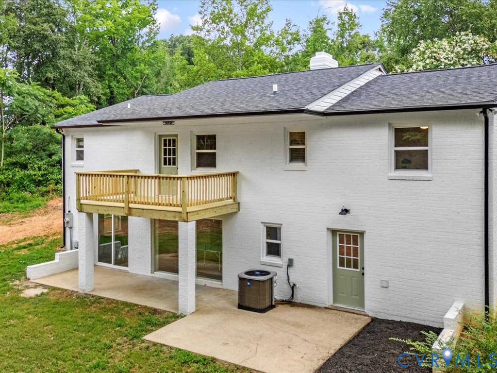 2291 Pony Farm Road Maidens, VA 23102 - Photo 41 of 43 a view of a house with a yard plants and large tree