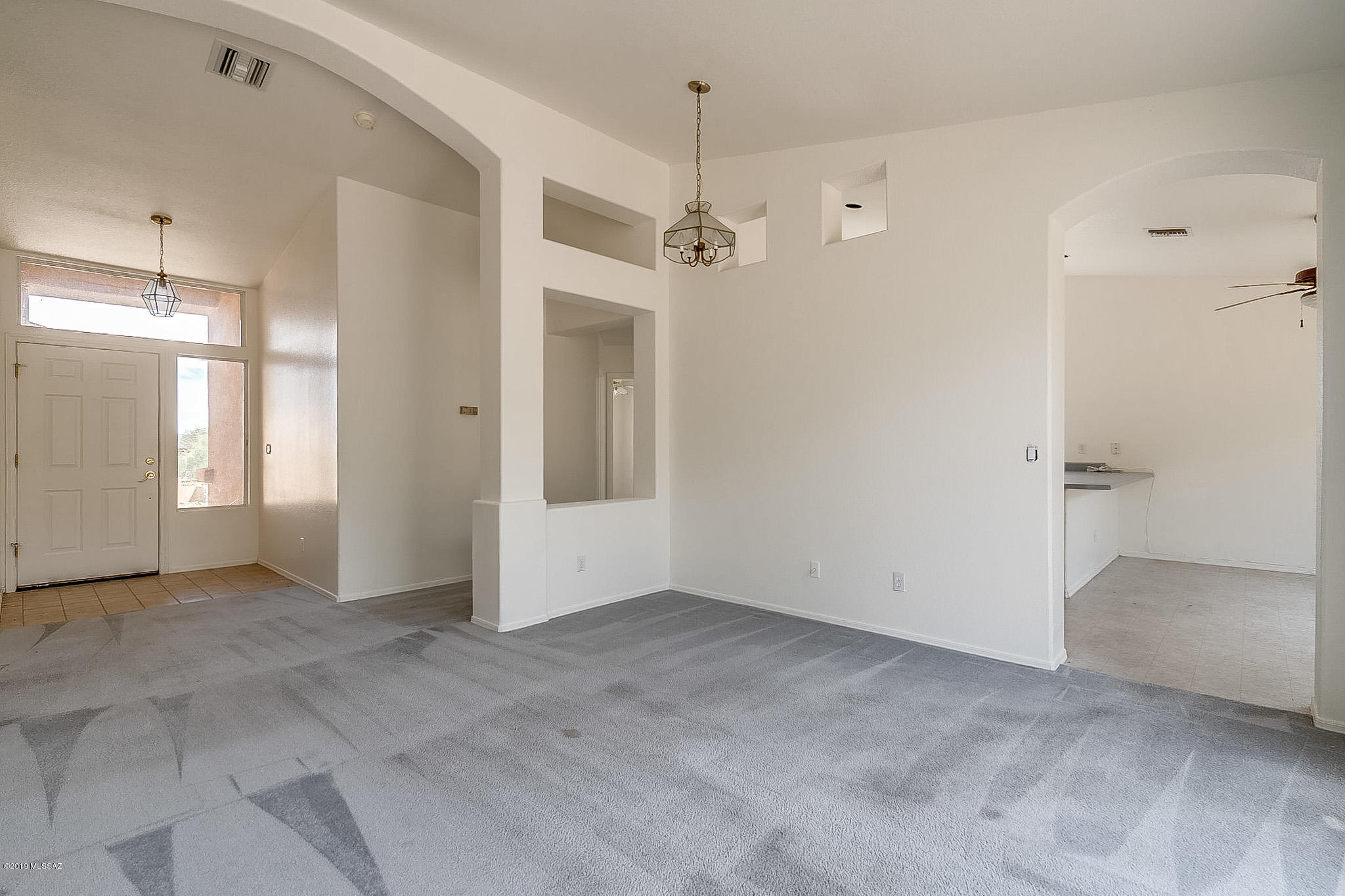 410 Wrightson Street Rio Rico, AZ 85648 - Photo 9 of 50 a view of a big room with closet and windows
