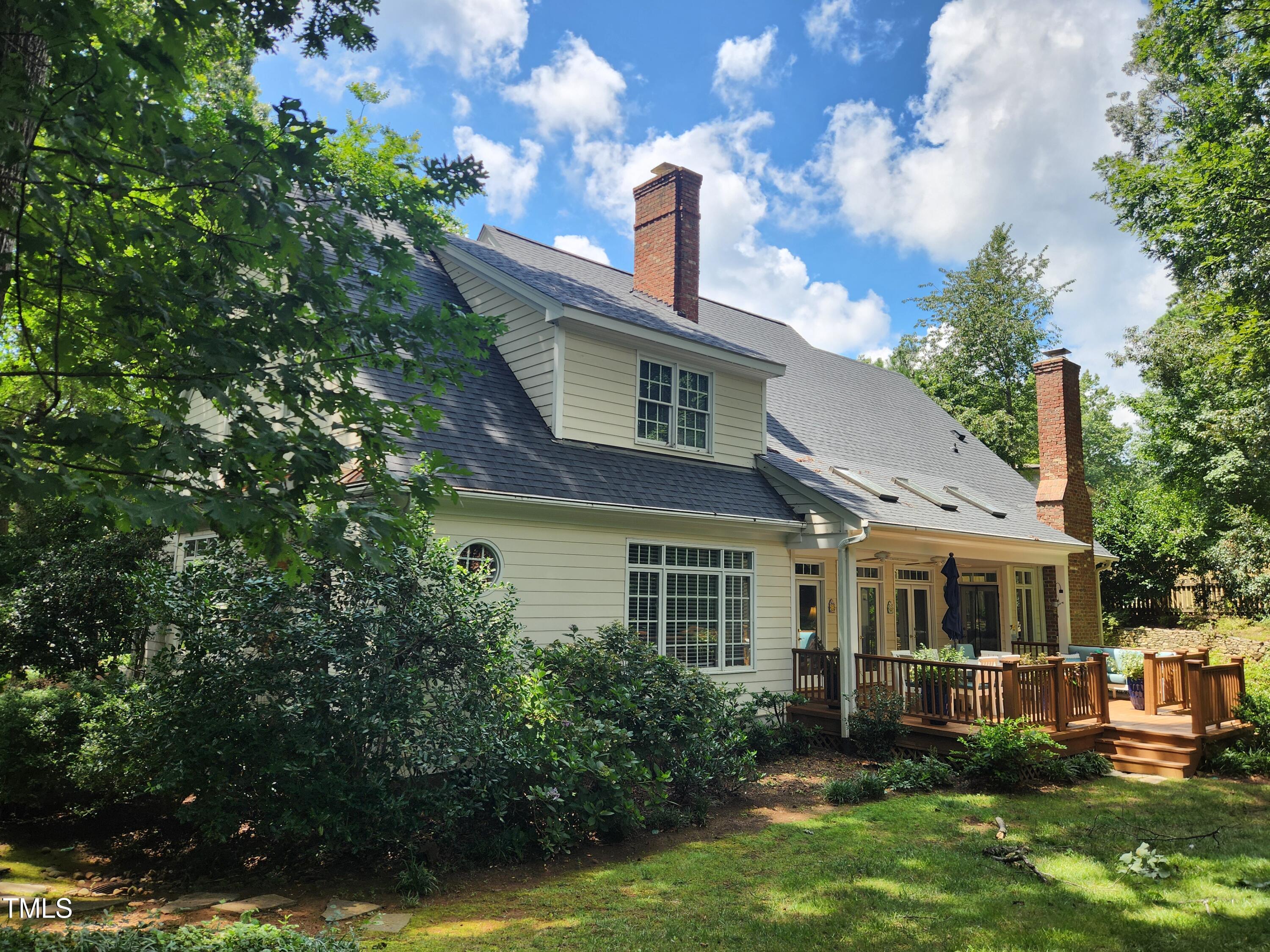 7516 Wingfoot Drive Raleigh, NC 27615 - Photo 12 of 34 a front view of a house with garden