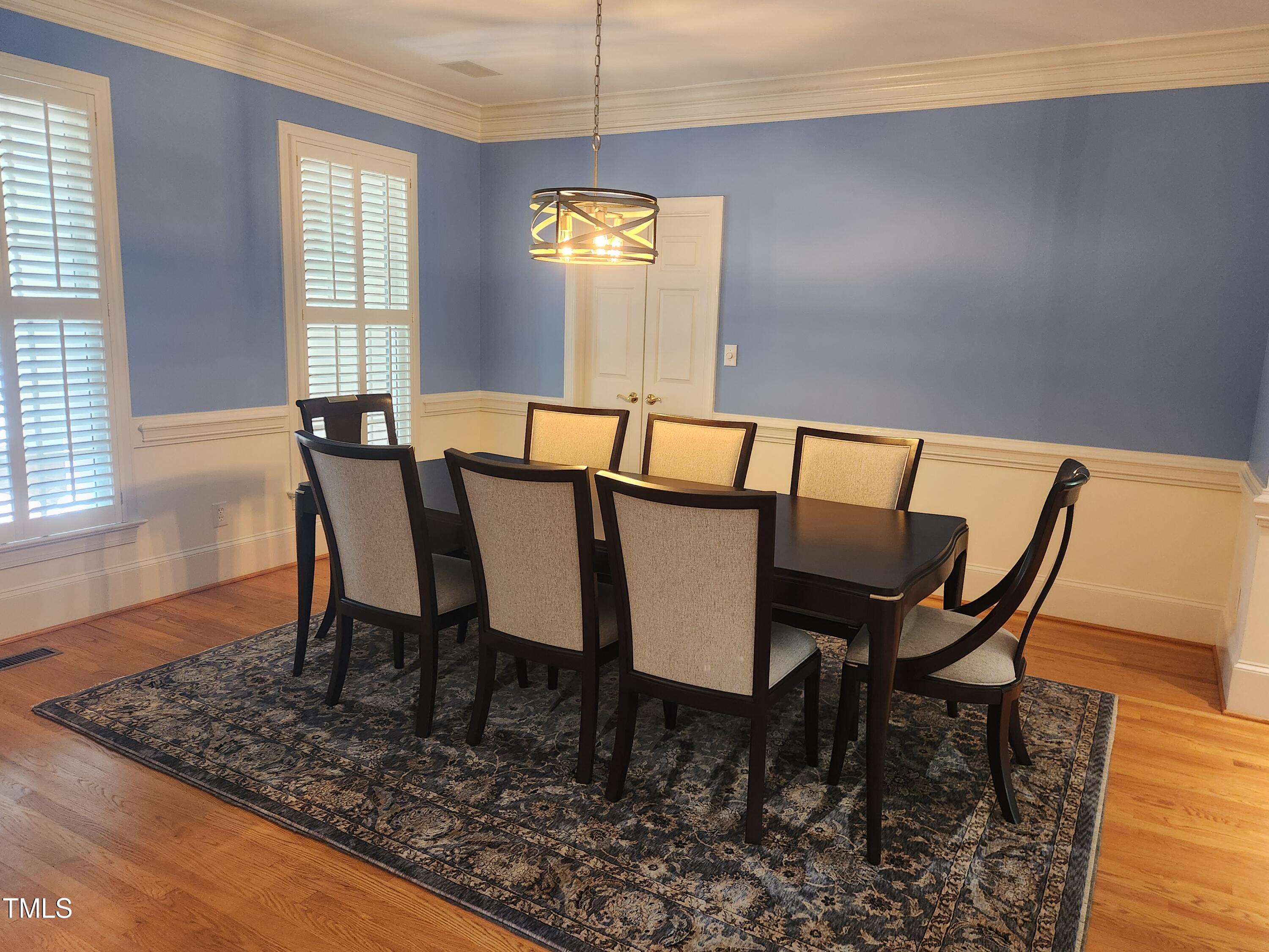 7516 Wingfoot Drive Raleigh, NC 27615 - Photo 16 of 34 a view of a dining room with furniture and window