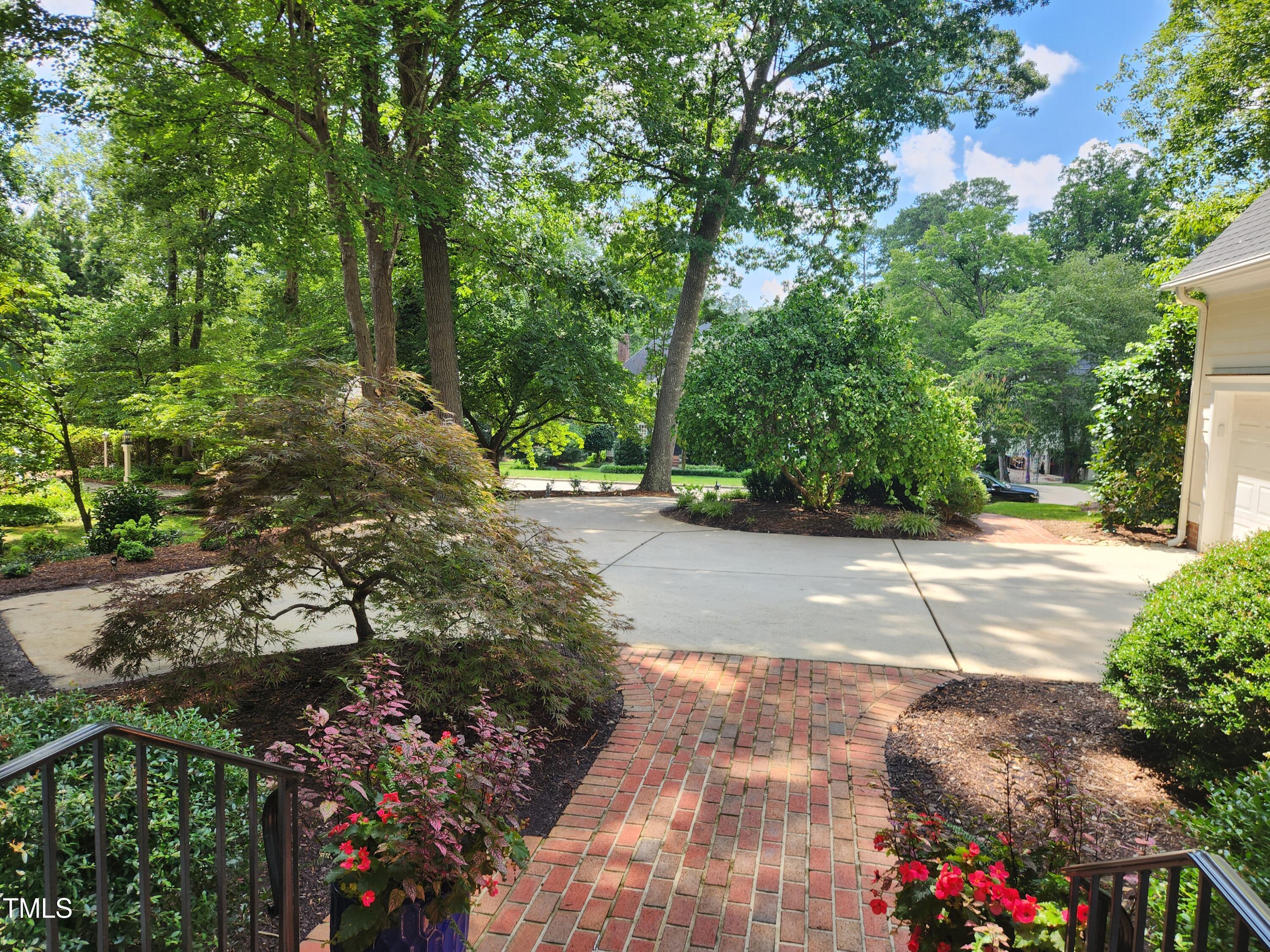 7516 Wingfoot Drive Raleigh, NC 27615 - Photo 34 of 34 a view of yard with tree in front of it