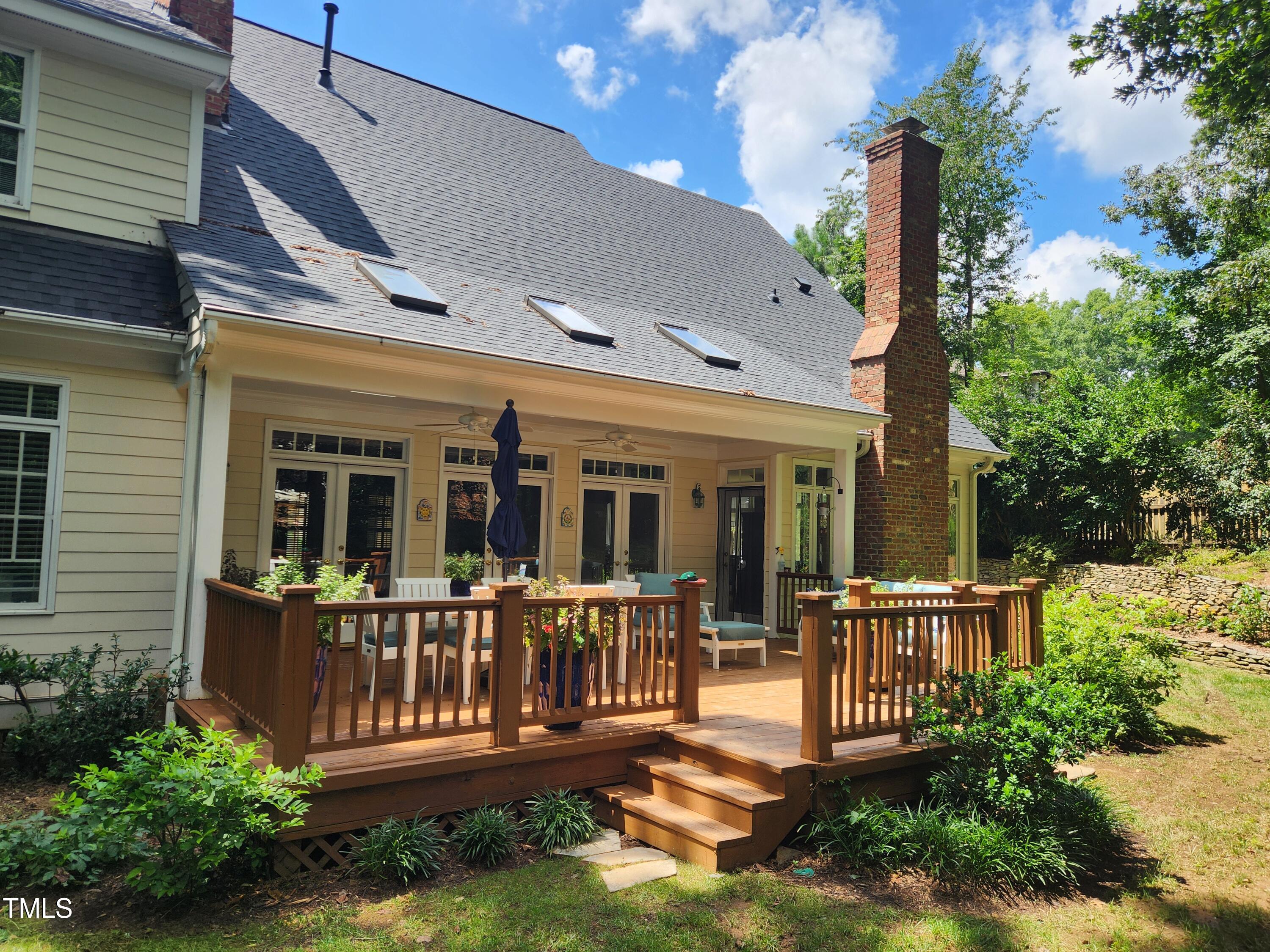 7516 Wingfoot Drive Raleigh, NC 27615 - Photo 9 of 34 front view of a house with a small yard