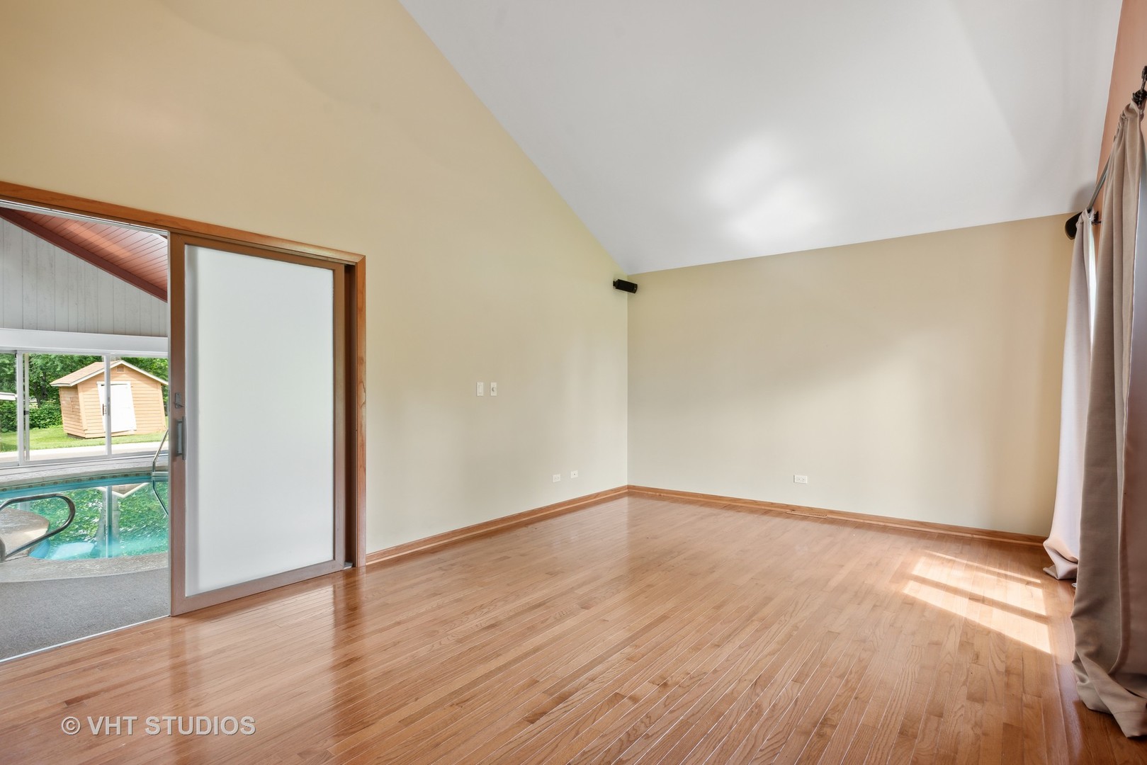 36W930 Bowes Road Elgin, IL 60124 - Photo 18 of 38 a view of an empty room with wooden floor and a window