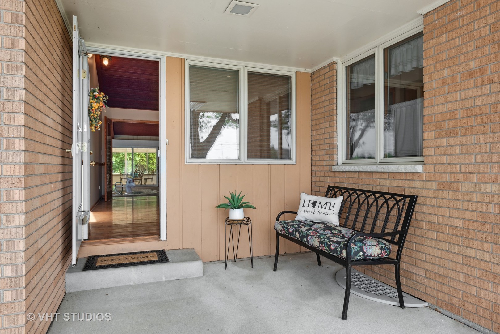 36W930 Bowes Road Elgin, IL 60124 - Photo 2 of 38 a outdoor living space with furniture and a window