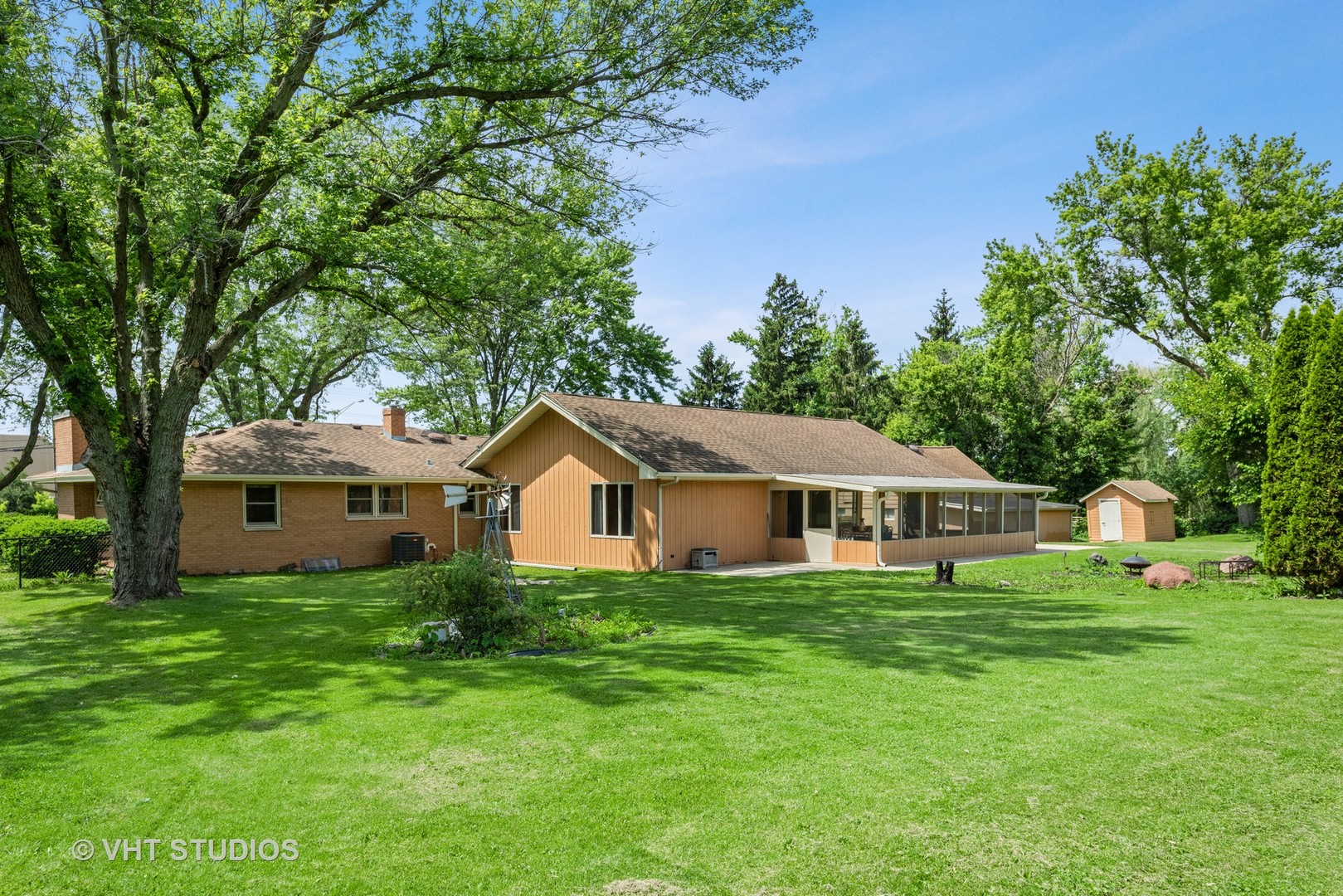 36W930 Bowes Road Elgin, IL 60124 - Photo 35 of 38 a white house with a big yard and large trees