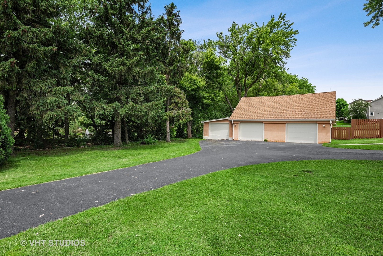 36W930 Bowes Road Elgin, IL 60124 - Photo 5 of 38 a view of a backyard with a garden