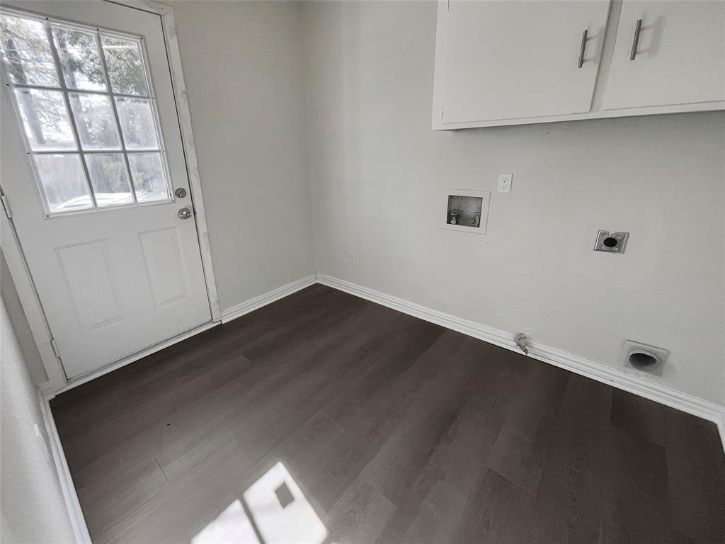 3925 Wedgworth Road South Fort Worth, TX 76133 - Photo 14 of 15 an empty room with wooden floor and windows