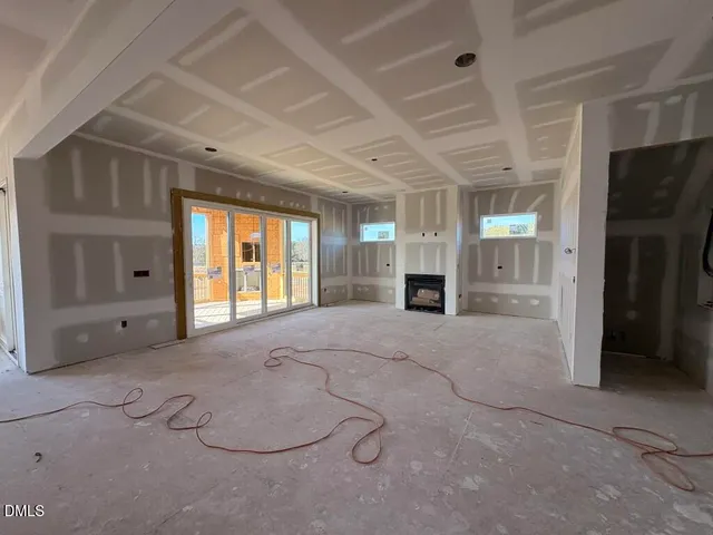 a big room with closet and windows