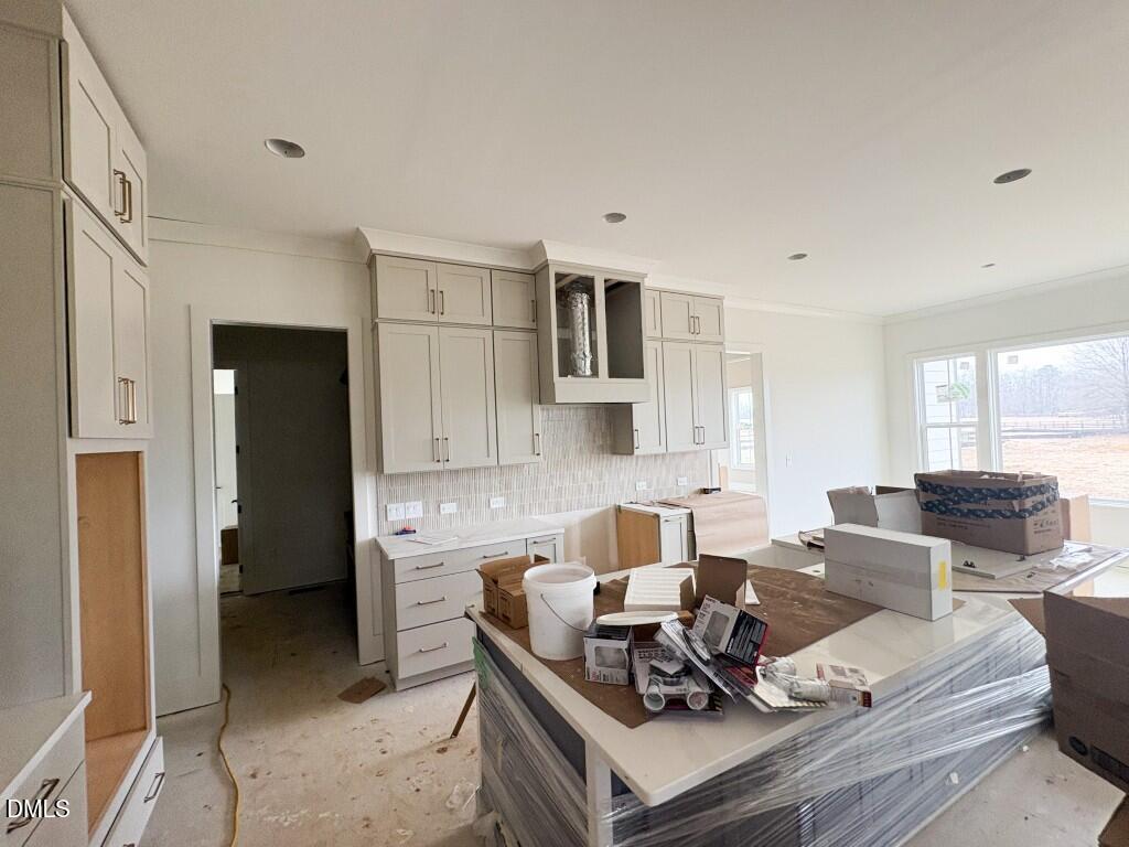 5816 Carriage Drive Raleigh, NC 27603 - Photo 2 of 14 a living room with furniture and a window