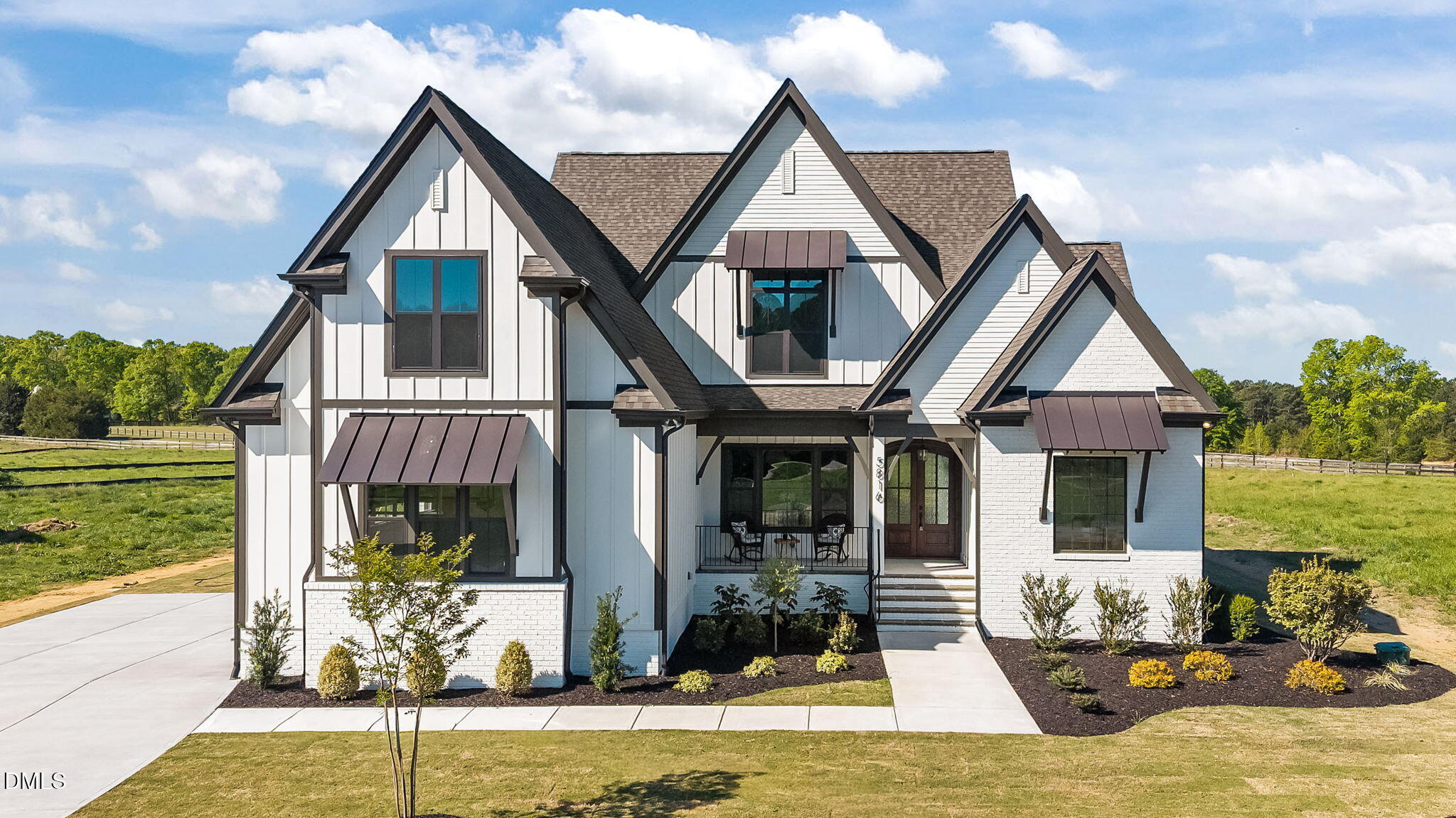 5816 Carriage Drive Raleigh, NC 27603 - Photo 2 of 56 4-web-or-mls-DJI_20260410101651_0833_D