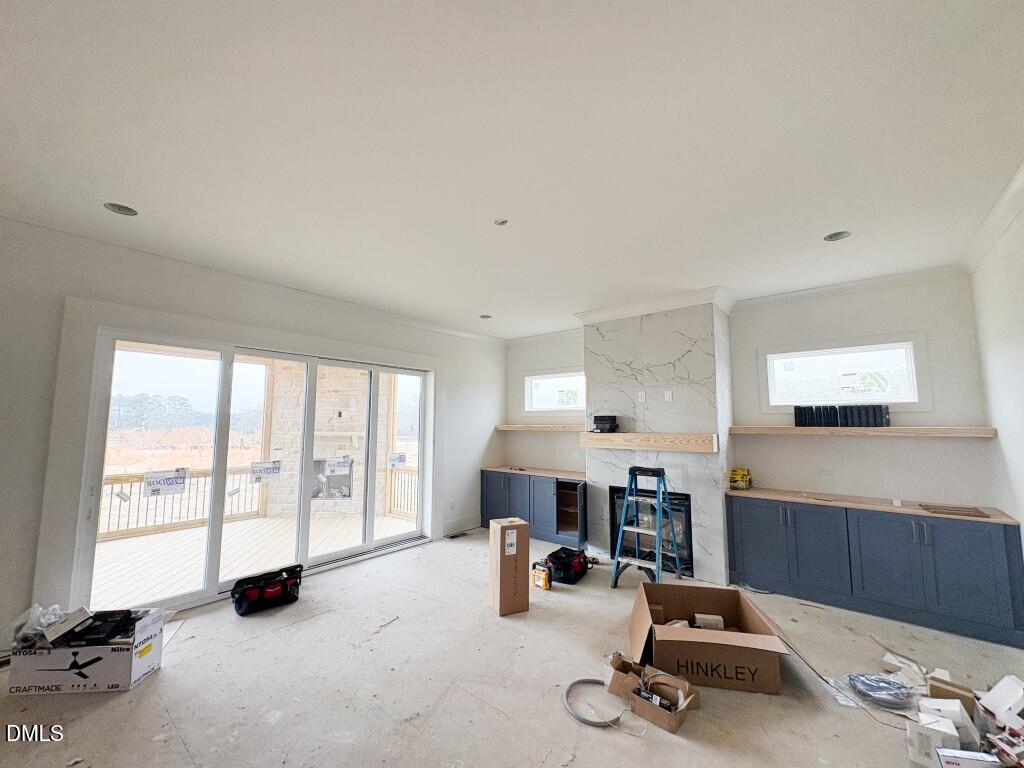 5816 Carriage Drive Raleigh, NC 27603 - Photo 3 of 14 a view of a livingroom with furniture and a large window