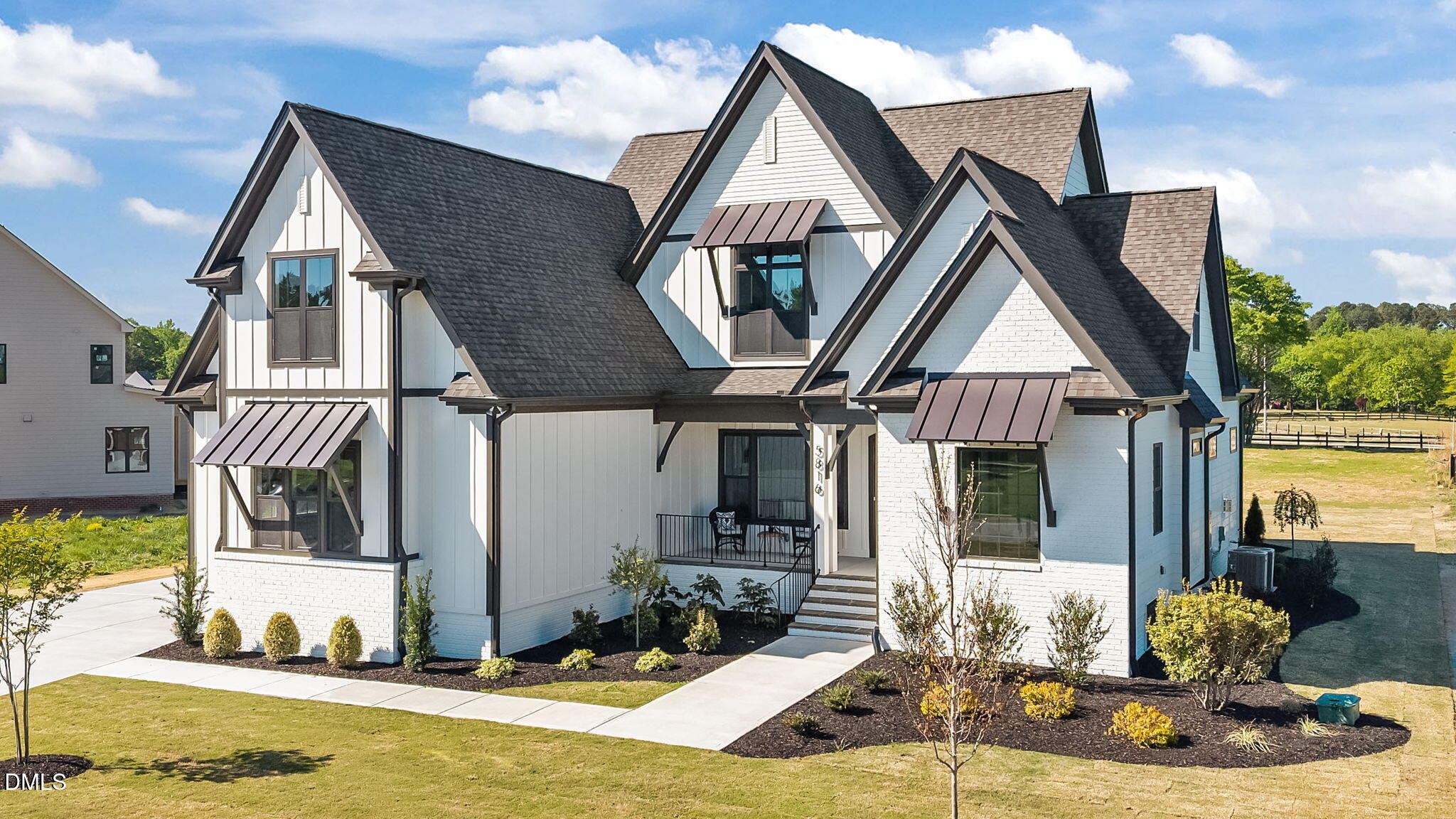 5816 Carriage Drive Raleigh, NC 27603 - Photo 3 of 56 5-web-or-mls-DJI_20260410101702_0834_D