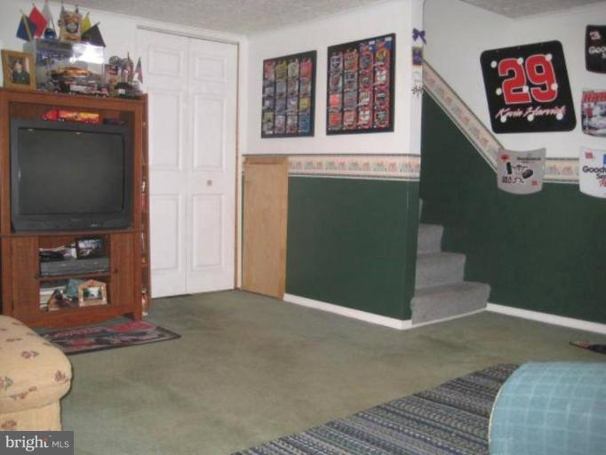 2248 Southorn Road Middle River, MD 21220 - Photo 12 of 21 a living room with furniture and a flat screen tv
