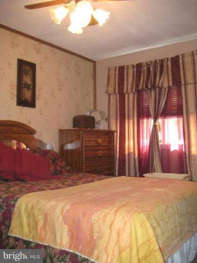 2248 Southorn Road Middle River, MD 21220 - Photo 20 of 21 a bedroom with a bed and a window