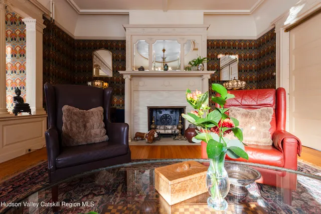a dining room with furniture and window
