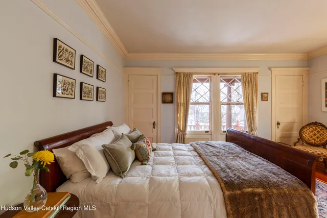 a dining room with a table and chairs