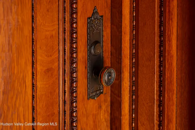 a view of a chairs and a table in the patio