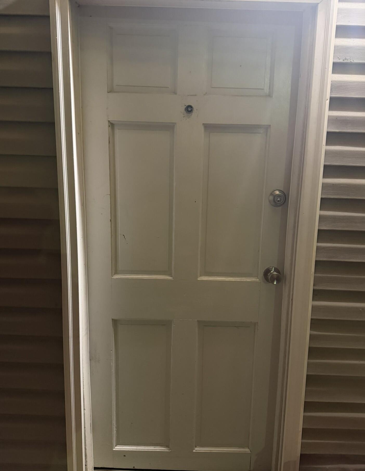 1209 Chapman Avenue Southwest, Unit B Roanoke, VA 24016 - Photo 1 of 7 a view of a hallway with a door