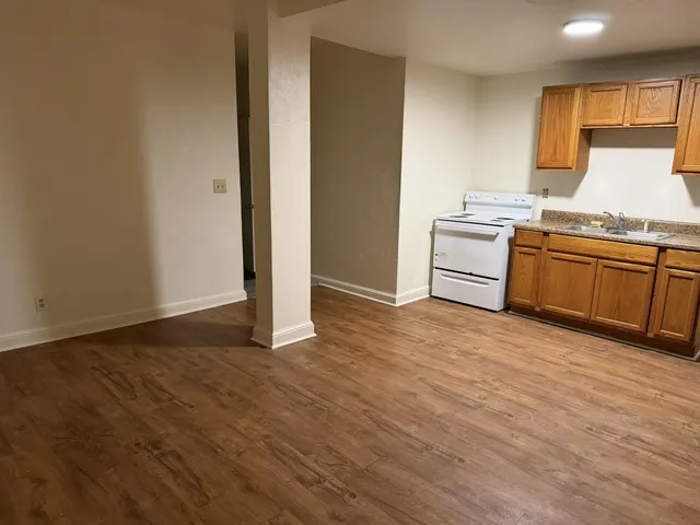 a view of entryway with wooden floor
