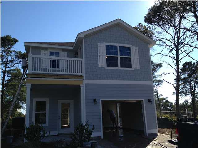 123 Grayling Way Inlet Beach, FL 32461 - Photo 1 of 6 a front view of a house with a yard