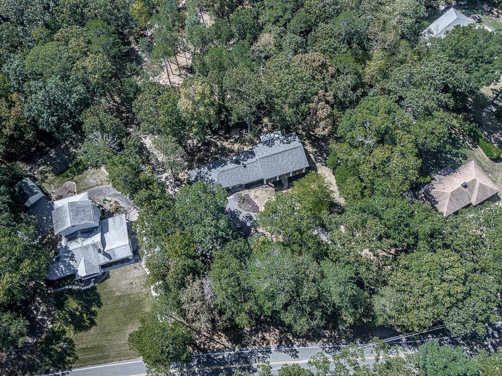 633 Butterworth Road Canton, GA 30114 - Photo 53 of 55 an aerial view of a house with yard and outdoor seating