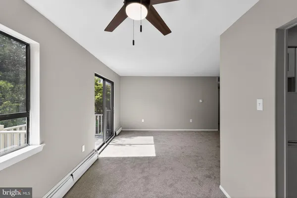 an empty room with windows