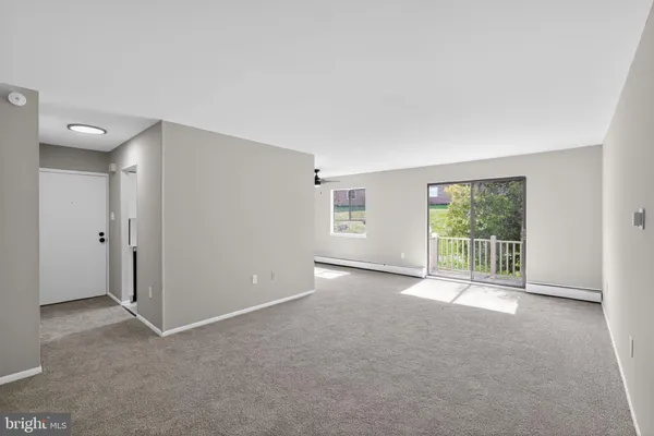 an empty room with windows