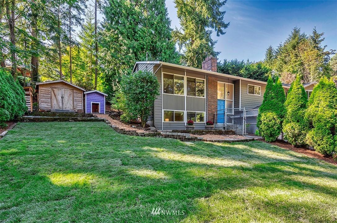 23002 Atlas Road Bothell, WA 98021 - Photo 1 of 23 a view of a house with a yard porch and sitting area